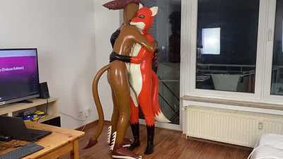 Rubber lion and orange fox