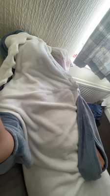 Pawing off in shark blanket.