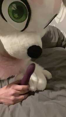 Horny femboy sucking on a dildo