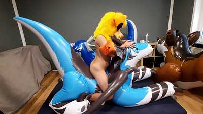 Finny yiffs a big inflatable dragon