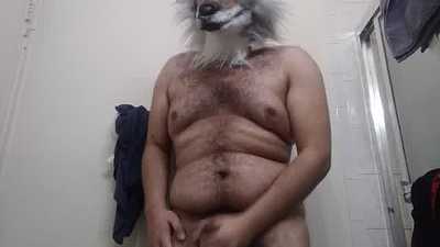 Sexy Werewolf likes to paw off his big cock.