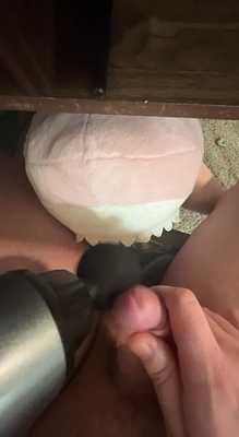 Using a theragun to give Sharkess a facial