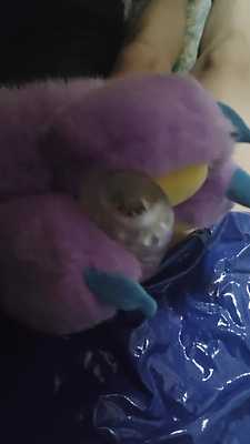 Wearing a patent leather skirt and masturbating with animal claws