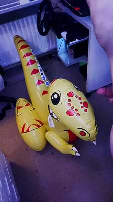 Jacking off over my yellow inflatable dinosaur & huge cumshot